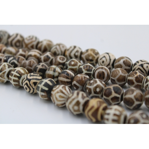 178 - A Tibetan Pumtek Petrified Wood Stone Dzi Beads Long Necklace.

L: Approximately 96cm
Each Bead: App... 