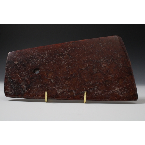 353 - A Chinese Red Hardstone Ritual Axe.

H: Approximately 8.1cm- 12.5cm
L: Approximately 21.2cm