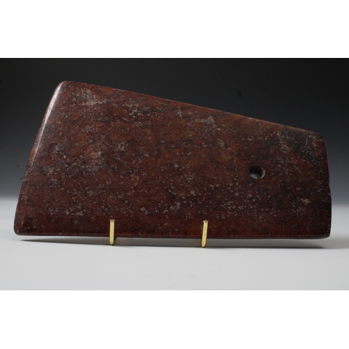 353 - A Chinese Red Hardstone Ritual Axe.

H: Approximately 8.1cm- 12.5cm
L: Approximately 21.2cm