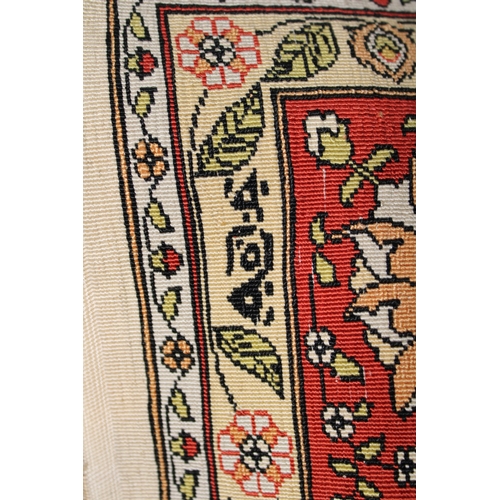 136 - An Islamic Turkish Handmade Signed Hereke Silk Prayer Rug.

L: Approximately 93cm
W: Approximately 6... 