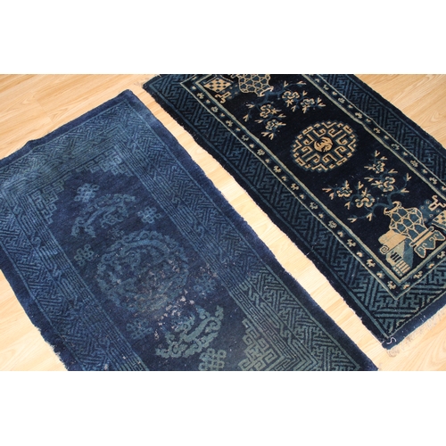 138 - A Lot of 2 Chinese Pao- Tao Blue Rug.

L: Approximately 128cm
W: Approximately 69.5cm