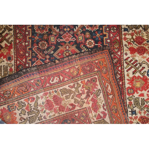 139 - A Persian Shiraz Runner Rug from the 19th Century.

L: Approximately 433cm
W: Approximately 105cm