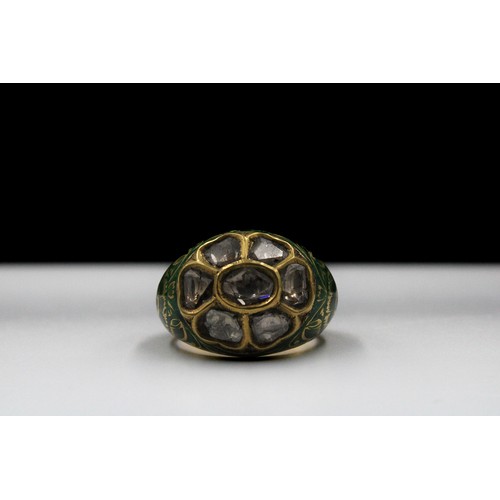 451 - An Indian Gold and Enamel Polki Diamond Ring.

Ring Size: US7.75/ UK17