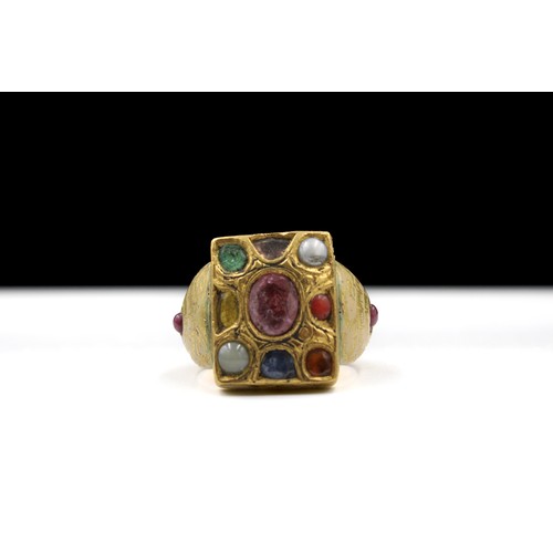 452 - An Indian Navaratna Gold and Enamel Ring with Real Stone.

Ring Size: US7.5/ UK16.5