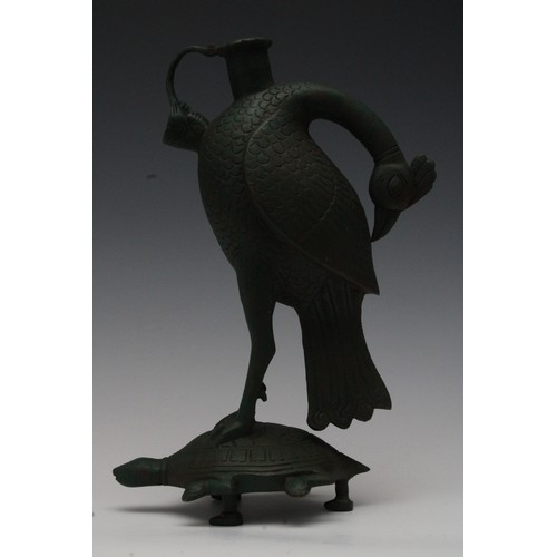 173 - An Indian Bronze Hookah Base in the Shape of a Bird Standing on Top of a Tortoise.

H: Approximately... 