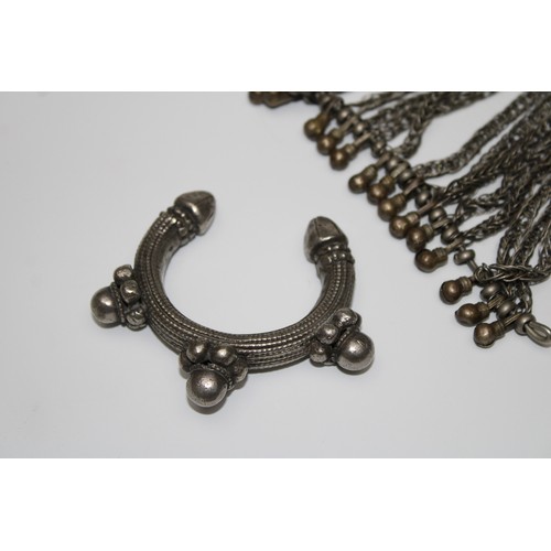 458 - A Lot of Yemeni White Metal Tribal Jewellery.

Contains:

Bedouin Necklace: L: Approximately 15cm
Br... 