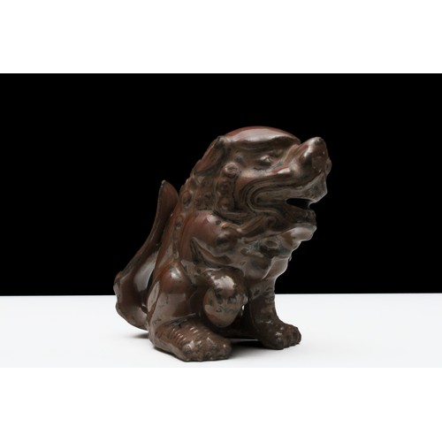 299 - A Chinese Porcelain Brown Figure in the Shape of a Foo Dog.

H: Approximately 11cm