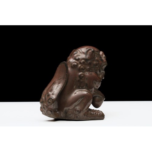 299 - A Chinese Porcelain Brown Figure in the Shape of a Foo Dog.

H: Approximately 11cm