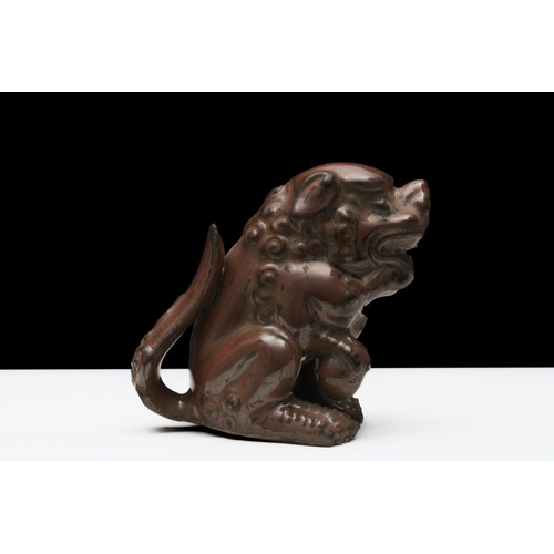 299 - A Chinese Porcelain Brown Figure in the Shape of a Foo Dog.

H: Approximately 11cm