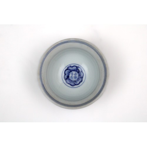 304 - A Chinese Blue & White Porcelain Cup Depicting Floral Patterns with Four-Figure Character Marks on t... 