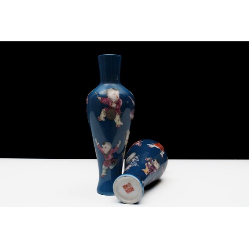 310 - A Pair of Chinese Blue Ground Famille Rose Vases Depicting Children Playing Instruments and Dancing ... 