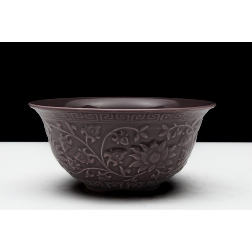 323 - A Chinese Porcelain Aubergine Bowl with Floral Patterns.

H: Approximately 5.5cm
D: Approximately 11... 