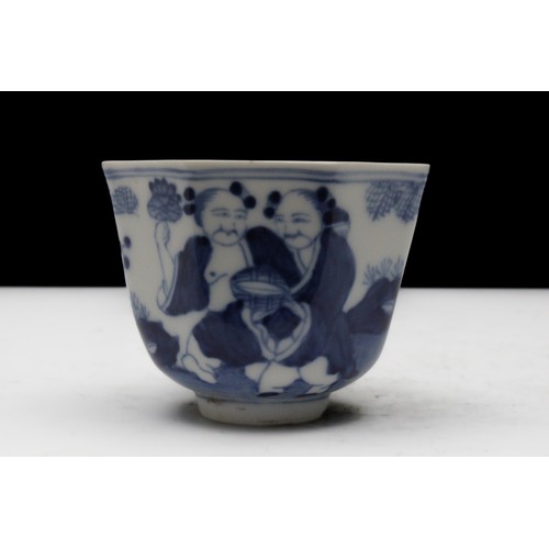 325 - A Chinese Porcelain Blue & White Octagonal Cup Depicting a Man and Woman Together.

H: Approximately... 