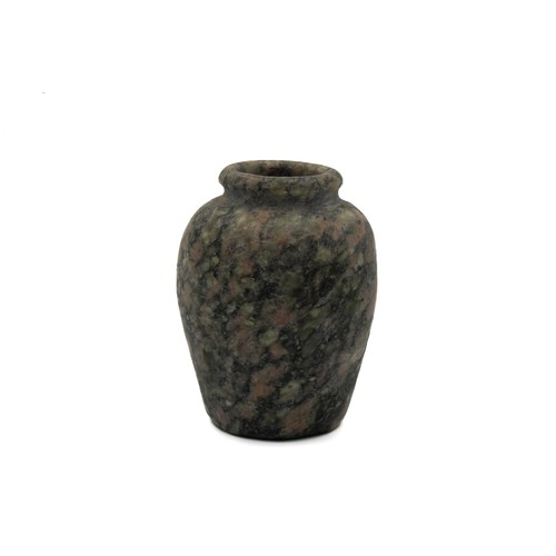 426 - An Egyptian Granite Miniature Vase from the Middle Kingdom Period 1500 B.C.

H: Approximately 6cm