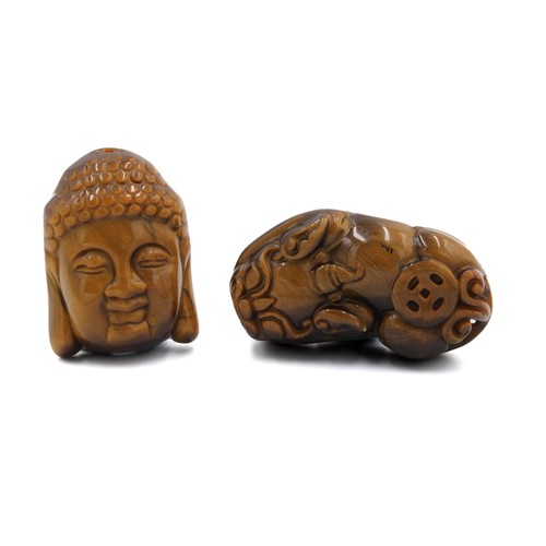 369 - A Lot of 2 Chinese Tiger's Eye Stone Pendants in the Shape of a Buddhist Deity and a Dragon.

L: App... 