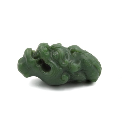 372 - A Chinese Green Jade Pendant Depicting a Dragon's Head.

L: Approximately 5cm