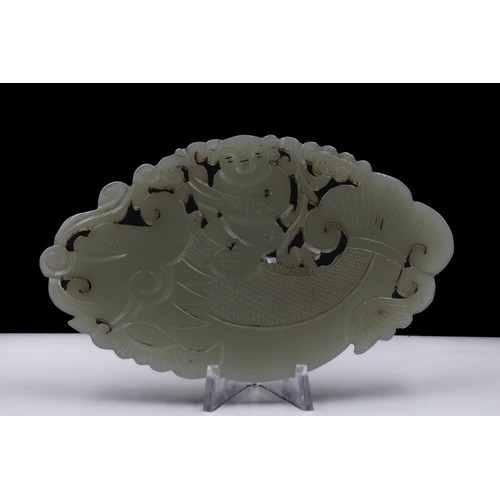 385 - A Chinese Large Hand Carved Jade Plaque with Intricate  Openwork Depicting a Man on a Fish.

L: Appr... 