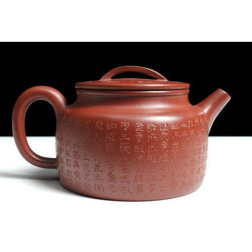 336 - A Chinese Yixing Zisha Teapot with Chinese Inscription with Character Marks to the Base.

H: Approxi... 