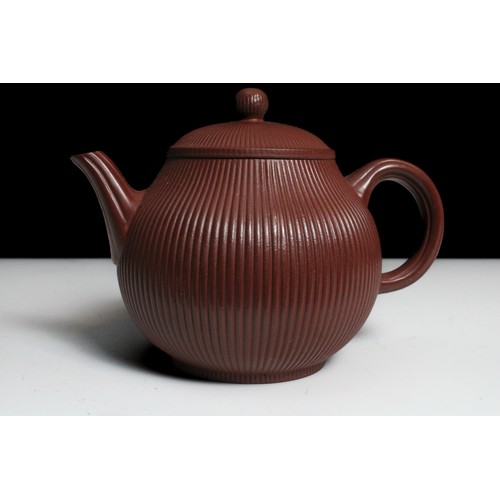 338 - A Chinese Yixing Zisha Teapot with Character Marks to the Base.

H: Approximately 11cm