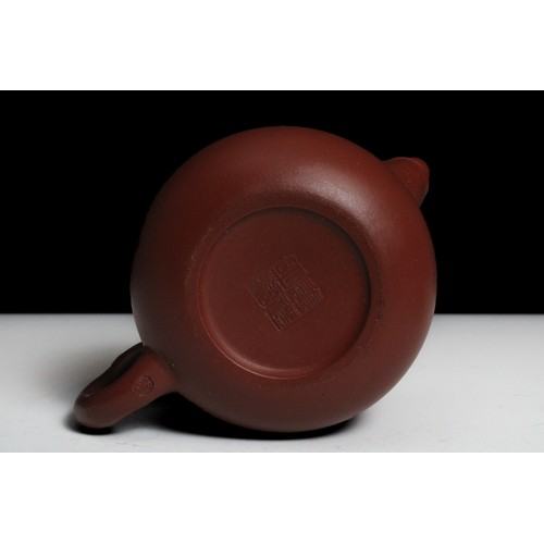 345 - A Chinese Yixing Zisha Teapot with Character Marks to the Base.

H: Approximately 9cm