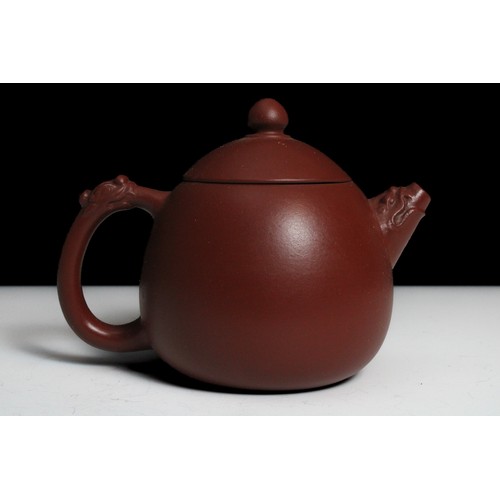 345 - A Chinese Yixing Zisha Teapot with Character Marks to the Base.

H: Approximately 9cm