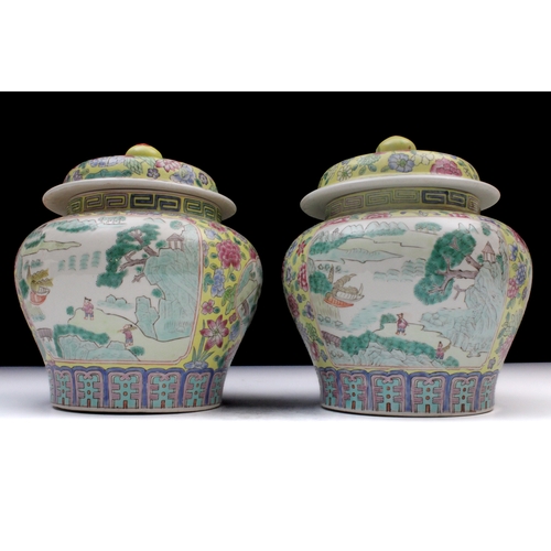 347 - A Pair of Chinese Yellow Ground Famille Rose Jars from the 20th Century.

H: Approximately 22cm