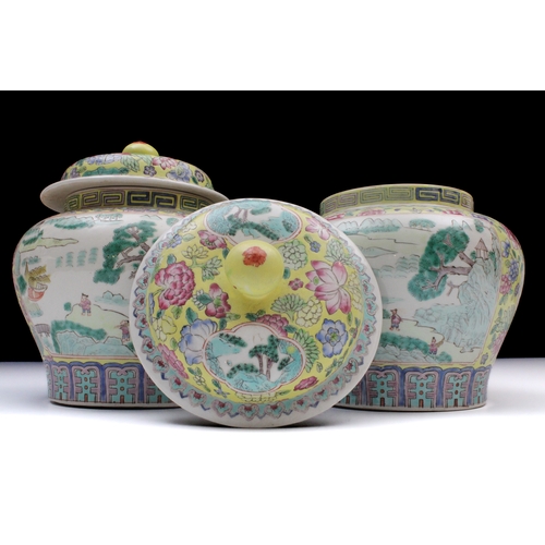 347 - A Pair of Chinese Yellow Ground Famille Rose Jars from the 20th Century.

H: Approximately 22cm