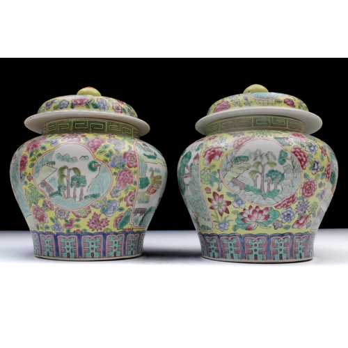 347 - A Pair of Chinese Yellow Ground Famille Rose Jars from the 20th Century.

H: Approximately 22cm