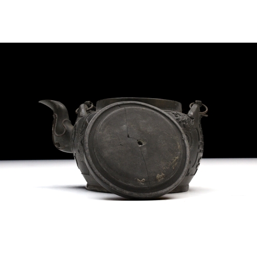 348 - A Chinese Yixing and Paktong Teapot from the Republic Period.

H: Approximately 10cm