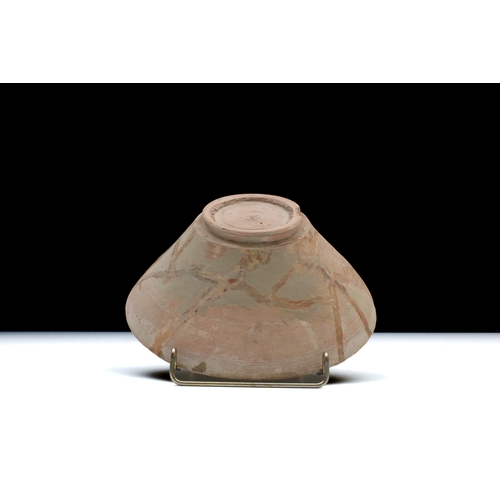 73 - An Islamic Ceramic Bowl from the 10th- 12th Century with Calligraphy.

D: Approximately 20.5cm