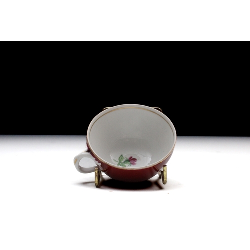 467 - A Russian Gardner Porcelain Tea Set from the 19th Century with a Beautiful Floral Design on a Deep P... 