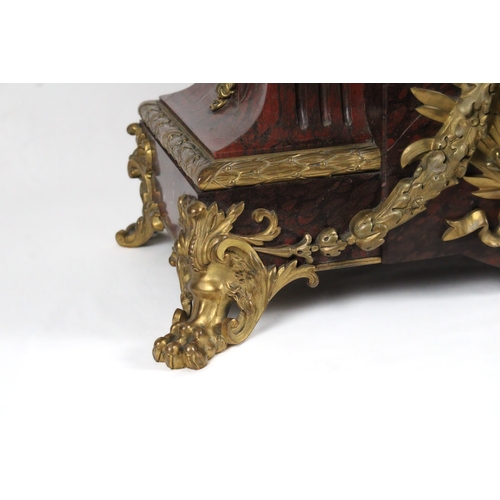 465 - A Parisian Belle Époque Griotte Marble and Bronze Gilt Mantel Clock from the Late 19th Century.