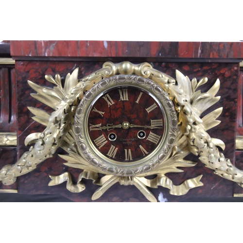 465 - A Parisian Belle Époque Griotte Marble and Bronze Gilt Mantel Clock from the Late 19th Century.