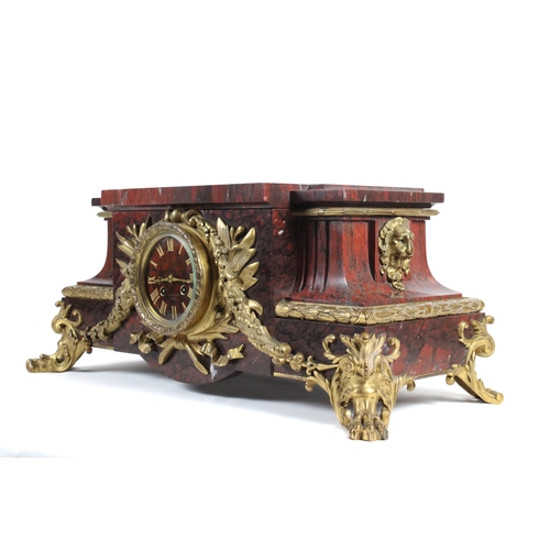 465 - A Parisian Belle Époque Griotte Marble and Bronze Gilt Mantel Clock from the Late 19th Century.