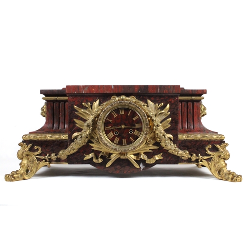 465 - A Parisian Belle Époque Griotte Marble and Bronze Gilt Mantel Clock from the Late 19th Century.