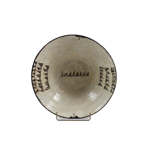 84 - An Islamic Nishapur Ceramic Bowl with Kufic Inscription.

D: Approximately 26.4cm