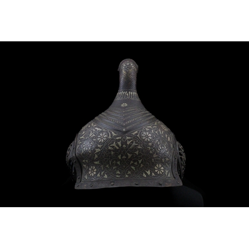 91 - An Indian Islamic Brass Helmet with Openwork in the Form of a Bird Decorated with Islamic Calligraph... 