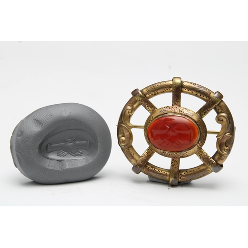 436 - A European Medieval Brooch with a Carnelian Engraved Gem from the 14th Century.