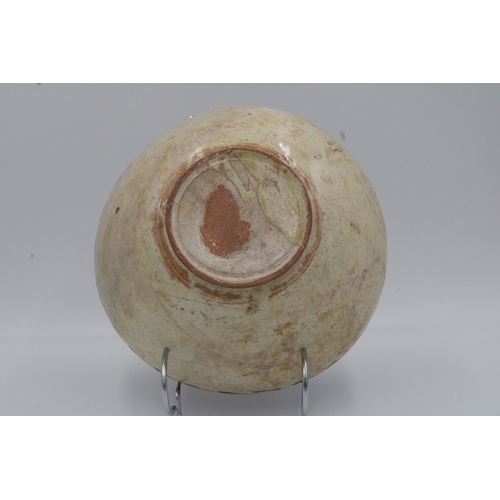 261 - An Islamic Nishapur Ceramic Bowl from the 12th Century.

D: Approximately 18cm