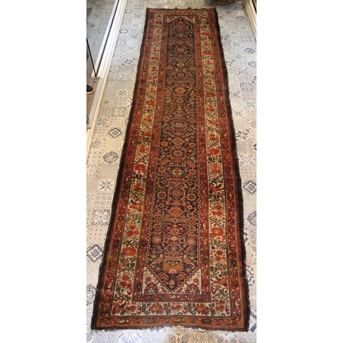 497 - A Persian Shiraz Runner Rug from the 19th Century.

L: Approximately 433cm
W: Approximately 105cm