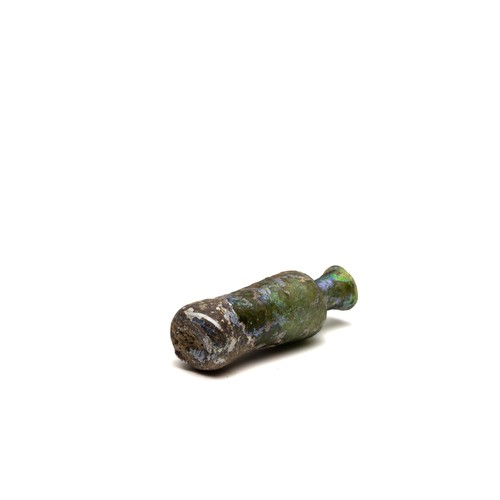 187 - An Islamic Green Glass Bottle with Lovely Rainbow Patina from the 11-12th Century.

H: Approximately... 