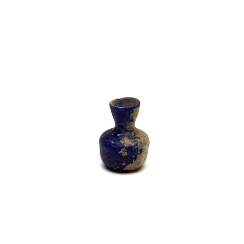 189 - An Islamic Blue Glass with Nice Patina from the 11-12th Century.

H: Approximately 5.5cm