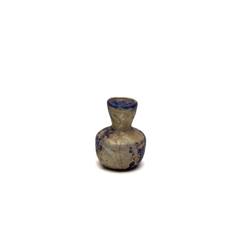 189 - An Islamic Blue Glass with Nice Patina from the 11-12th Century.

H: Approximately 5.5cm