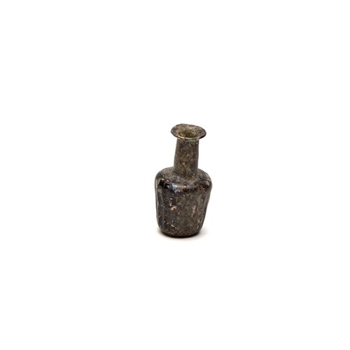 191 - An Islamic Light Green Glass Moulded Bottle with Lovely Patina from the 11-12th Century.

H: Approxi... 