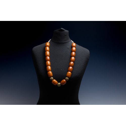 432 - A Tribal Yemeni Amber Colour Beads with 3 Yellow Metal Beads Necklace.

224g