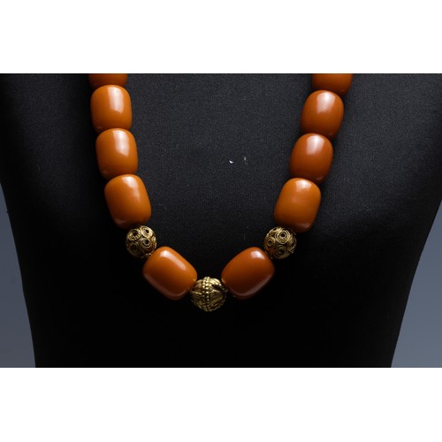 432 - A Tribal Yemeni Amber Colour Beads with 3 Yellow Metal Beads Necklace.

224g