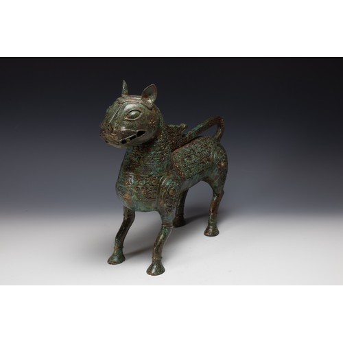 369 - A Large Chinese Islamic Bronze Lion with Intricate Carving with Character Marks to the Base.

H: App... 