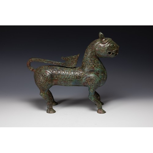 369 - A Large Chinese Islamic Bronze Lion with Intricate Carving with Character Marks to the Base.

H: App... 