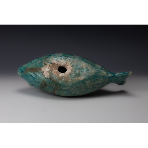 199 - A Sassanid Green Ceramic Bottle in the Form of a Fish.

L: Approximately 34.5cm