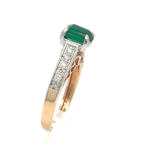 436 - An Emerald and Diamond Ring in Rose and White Gold.

Emerald Weight: Approximately 1ct
Stamped 14K 5... 